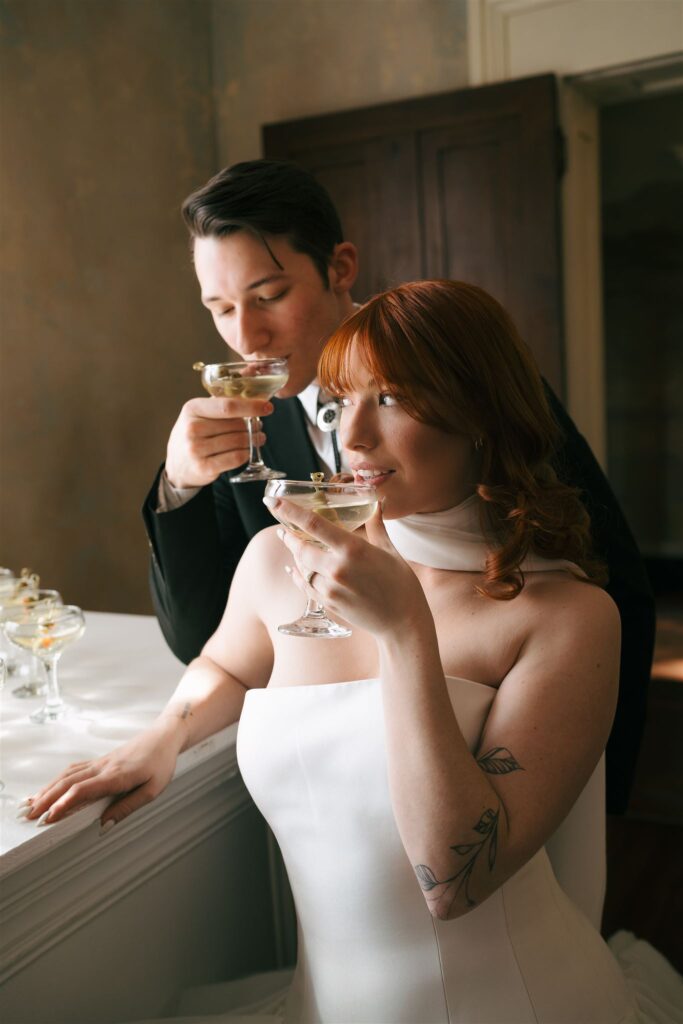 editorial couple sipping martinis at editorial wedding