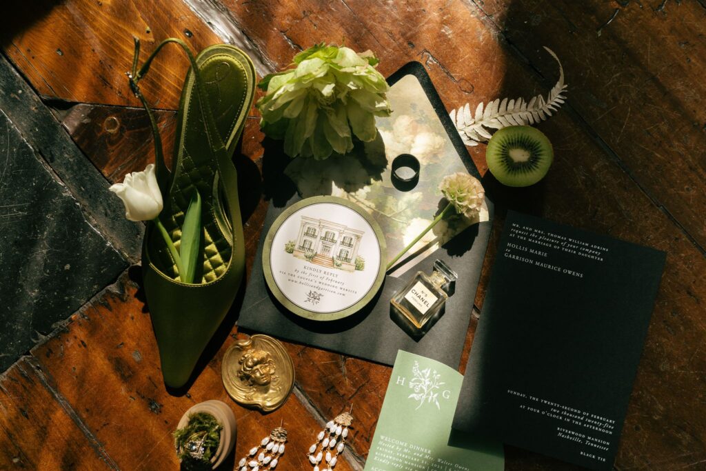 editorial green wedding flat lay with creative light 