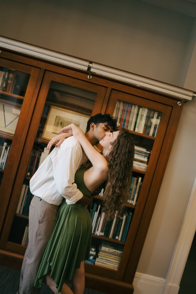 couple romantically hugging at a library in Nashville