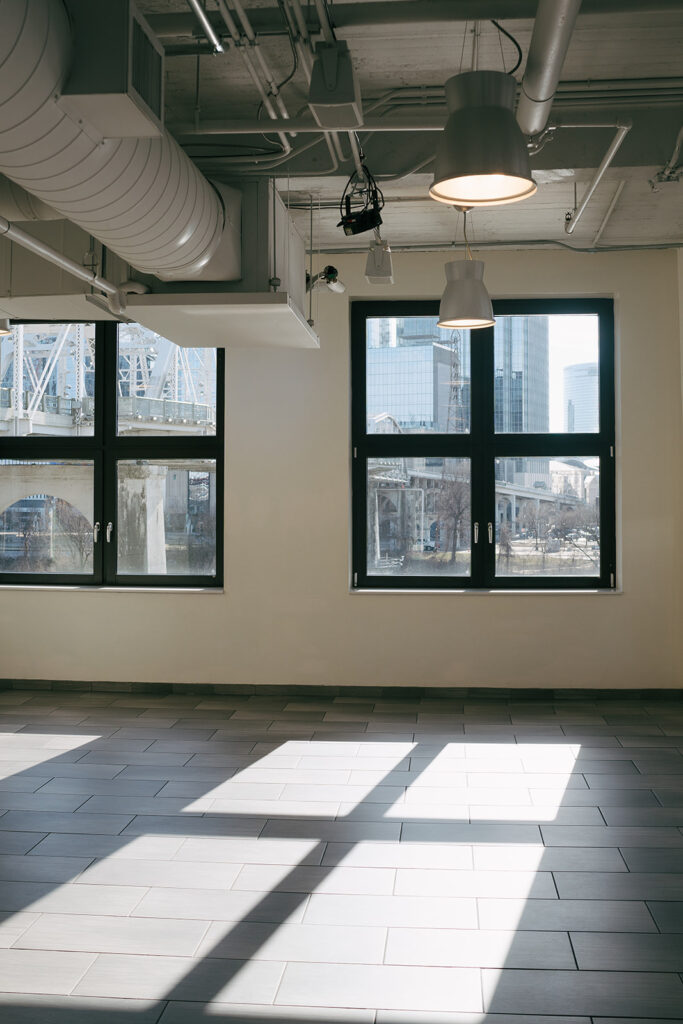 industrial room in nashville wedding venue with big windows letting in natural light 